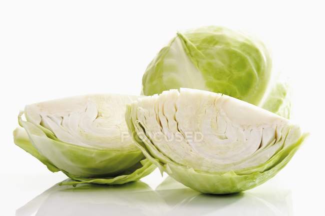 White cabbages whole and pieces — Stock Photo