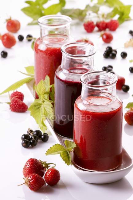 Strawberry smoothie on tray — Stock Photo