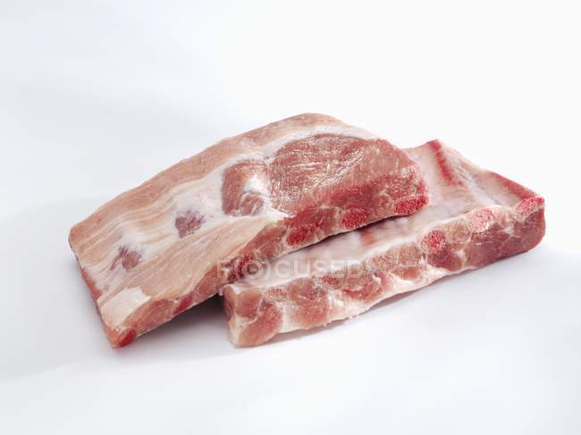 Costillas de cerdo crudas - foto de stock