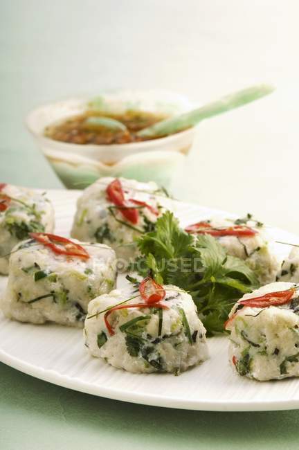 Fish cakes with fresh coriander — Stock Photo