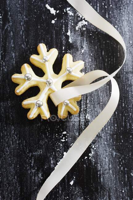 Christmas biscuit with silver dragees — Stock Photo