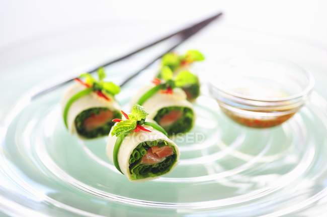 Tortilla rolls filled with salmon — Stock Photo