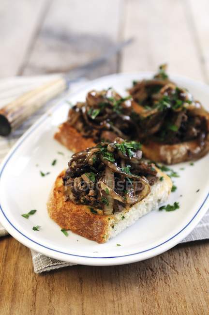 Crostini topped with liver — Stock Photo