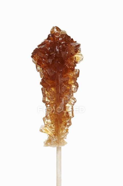 Closeup view of one sugar swizzle stick on white background — Stock Photo