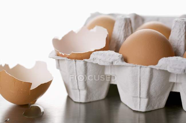 Fresh Eggs in egg box — Stock Photo