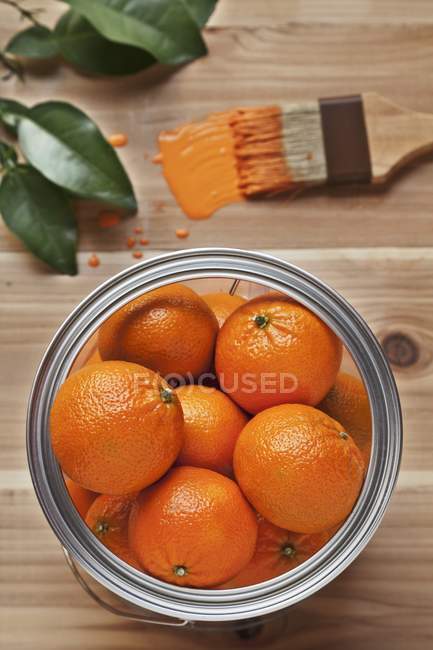 Fresh ripe Oranges in pan — Stock Photo