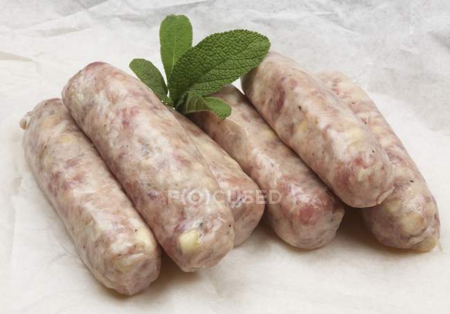 Raw pork sausages — Stock Photo