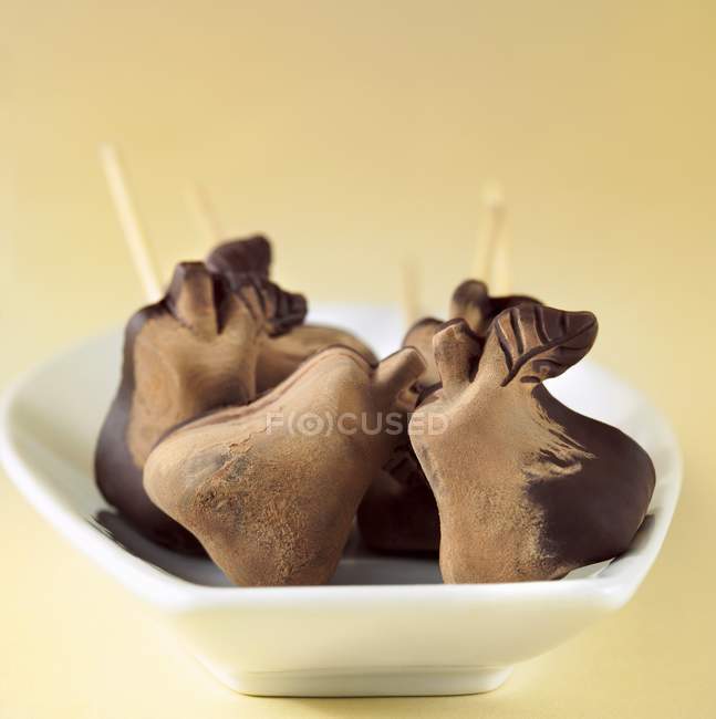 Palos de chocolate en forma de pera - foto de stock