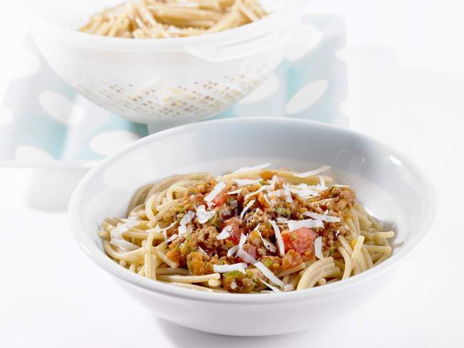 Spaghetti bolognese with cheese — Stock Photo