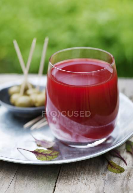 Beetroot, carrot and cucumber juice in glass — Stock Photo