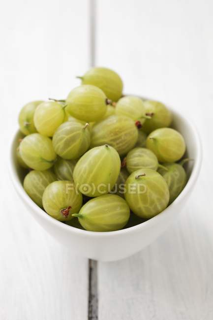 Ciotola di uva spina verde — Foto stock