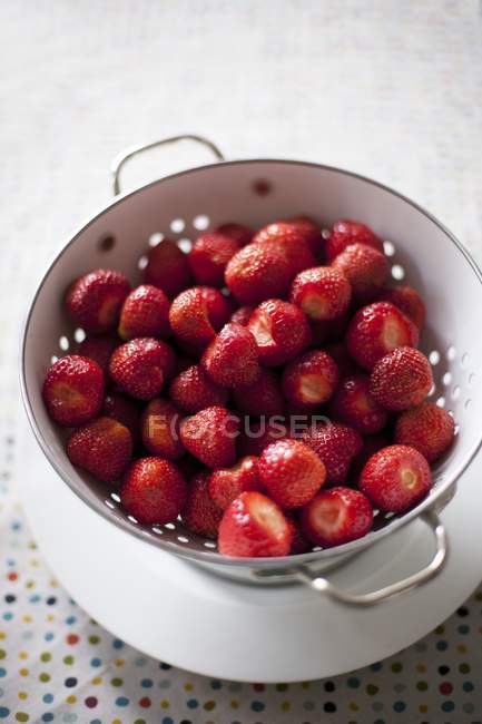 Fresh Strawberries in colander — Stock Photo