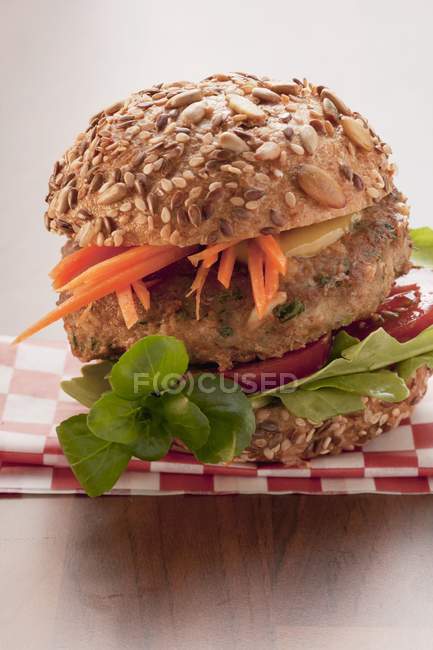 Burger with grated carrots — Stock Photo