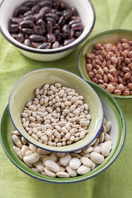 Colorful beans in bowls — Stock Photo