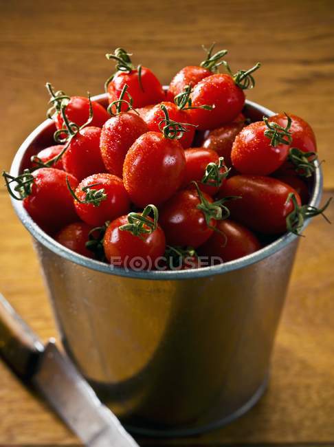 Багато сливових помідорів — стокове фото