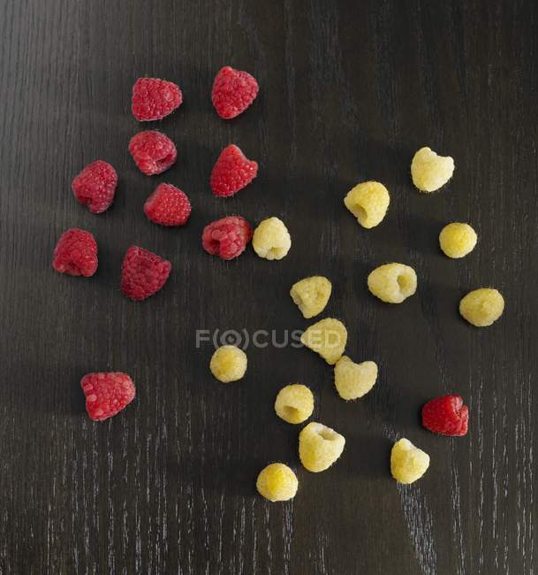 Red and yellow raspberries — Stock Photo