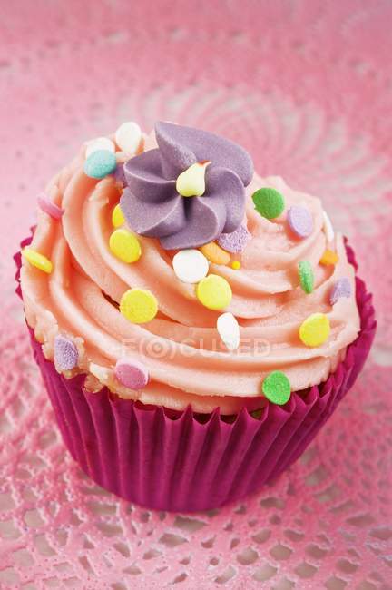Cupcake decorated with buttercream — Stock Photo
