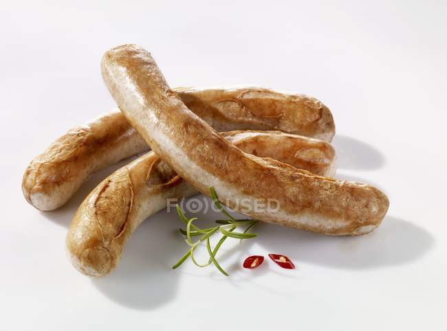 Salsichas brancas fritas — Fotografia de Stock