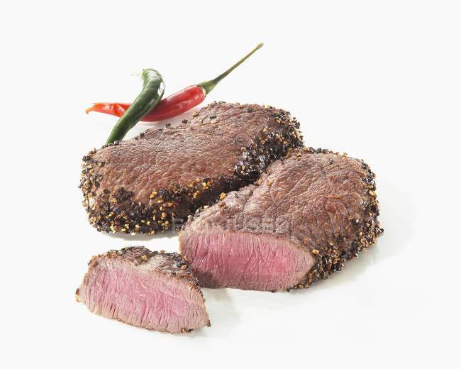 Two pepper steaks — Stock Photo