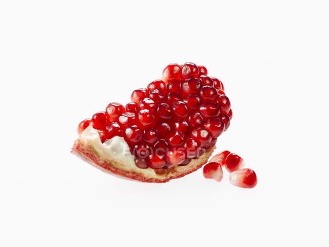 Piece of Pomegranate with Seeds — Stock Photo