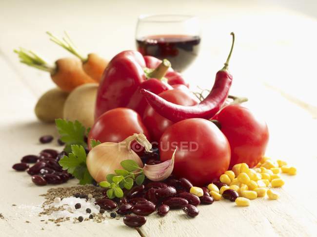 Ingredients for chilli con carne over wooden surface — Stock Photo