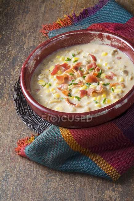 Closeup view of clam and corn Chowder with bacon in bowl — Stock Photo