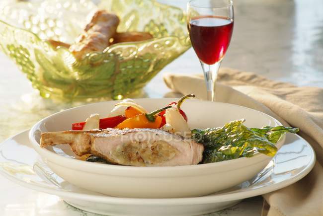 Stuffed pork loin with vegetables — Stock Photo
