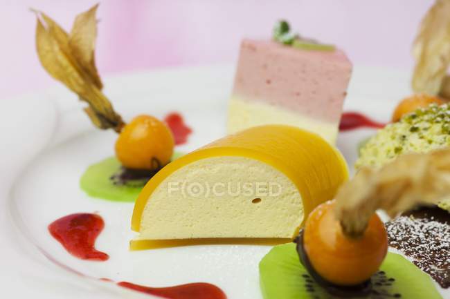 Mango mousse with physalis — Stock Photo