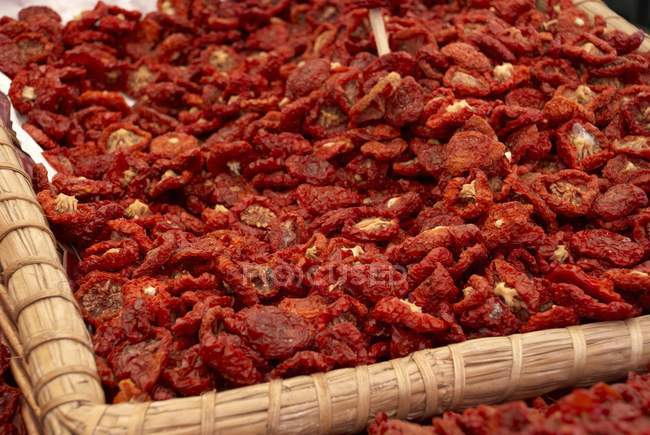 Basket of dried tomatoes — Stock Photo