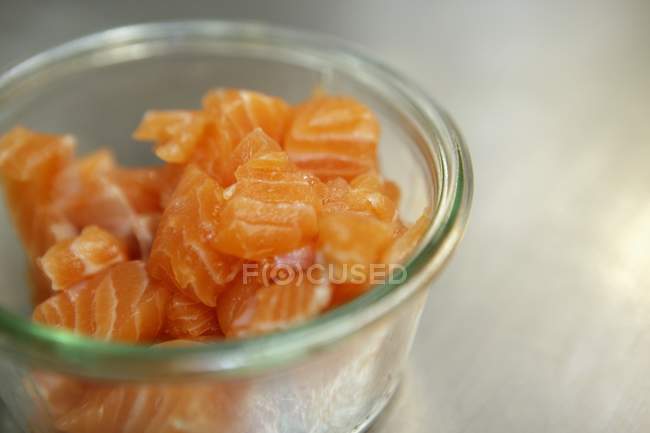 Diced raw salmon — Stock Photo