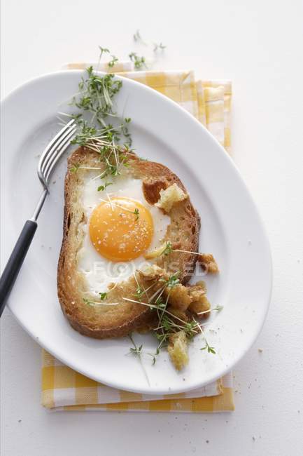 Slice of bread with eggs — Stock Photo