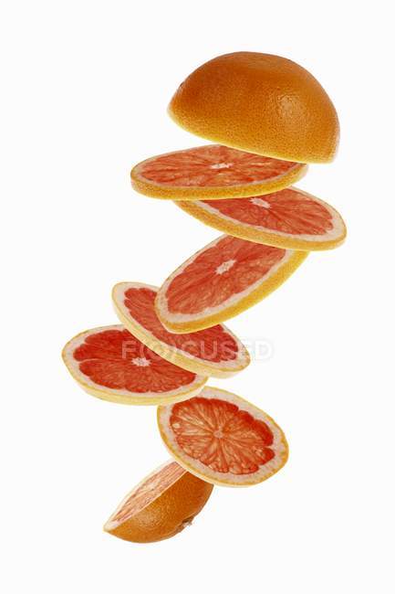 Rosa Grapefruit in Scheiben geschnitten — Stockfoto