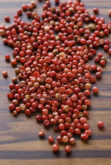 Heap of dried red peppercorns — Stock Photo
