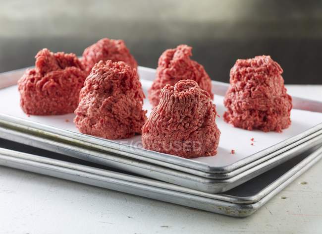 Small Piles of Raw Ground Beef — Stock Photo