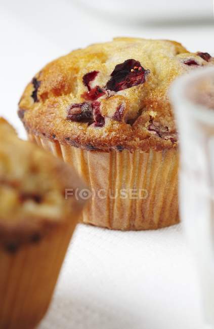 Cranberry muffins on table — Stock Photo