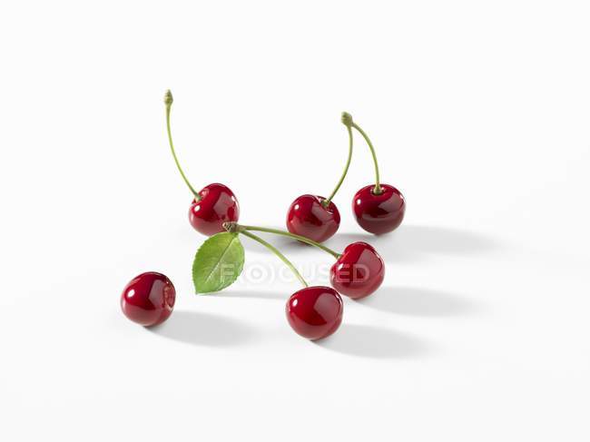 Fresh red Cherries with leaf — Stock Photo