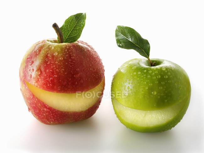 Red and a green apples — Stock Photo