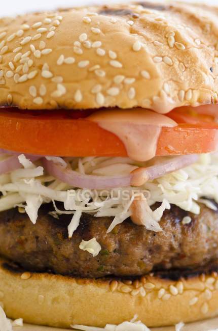 Burger with shredded white cabbage — Stock Photo