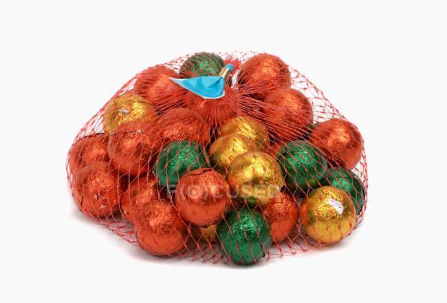Chocolate balls wrapped in foil — Stock Photo