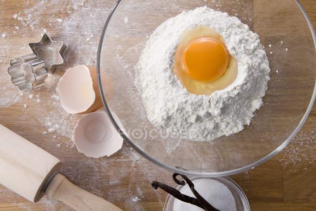 Top view of baking ingredients, cookie cutters and rolling pin — Stock Photo