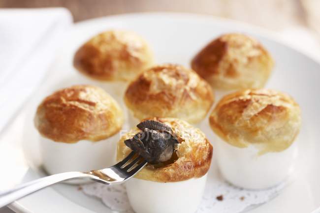 Closeup view of baked Escargot in puff pastry — Stock Photo