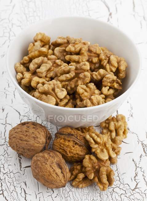 Bowl of whole walnuts — Stock Photo