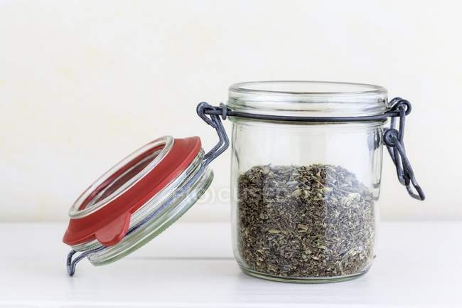 Closeup view of Herbs de Provence in an opened jar — Stock Photo