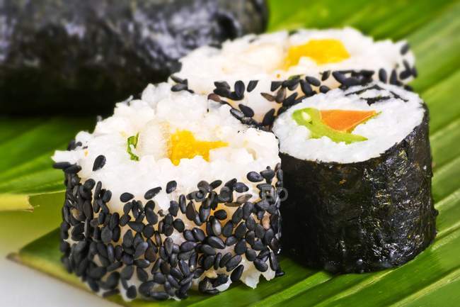 Maki sushi with sesame seeds — Stock Photo
