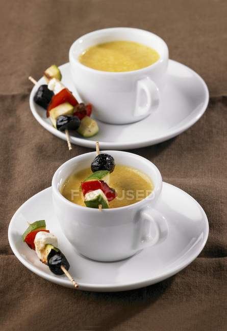 Carrot soup served in cups — Stock Photo