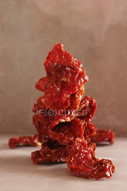 Stack of dried tomatoes — Stock Photo