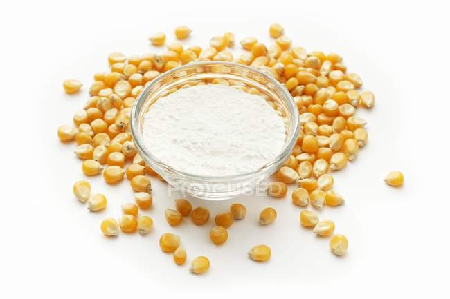 Cornflour and corn kernels — Stock Photo