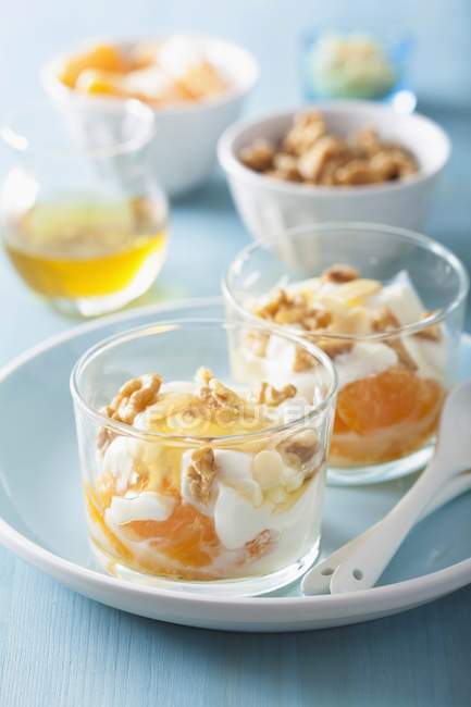 Yogurt with mandarins with bowls — Stock Photo