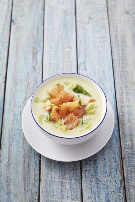 Potato and coconut soup with salmon — Stock Photo
