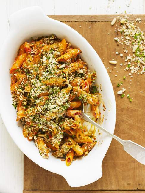 Gratinated penne with tomatoes — Stock Photo